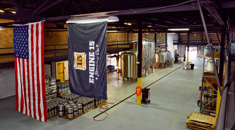 Bob.Mack@jacksonville.com - 4/23/15 - Engine 15's brewery currently includes a bright tank, two fermentation tanks and a brew house that they use for production of their beers. The brewery on Myrtle Avenue in Jacksonville, FL is not open to the public yet, but the beer garden and even a Bocce court are ready to go. On Thursday April 23, 2015 Co-owners and brewmasters Luch Scremin and Sean Bielman lead a tour of the brewing facility and the other buildings they own for future growth. (The Florida Times-Union, Bob Mack)